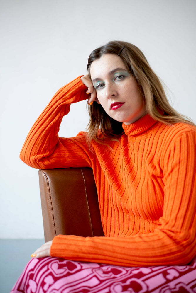 Ribbed knit high neck sweater | orange
